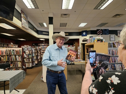 Joe recording a Facebook Live stream at Ferguson Books in Grand Forks, ND